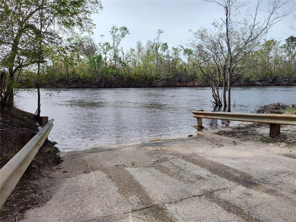 Cr-53 Mayo, FL 32066 - Photo 11 of 11 a backyard of a house with trees