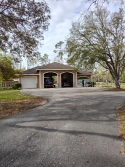 Cr-53 Mayo, FL 32066 - Photo 6 of 11 a front view of house with yard and trees around