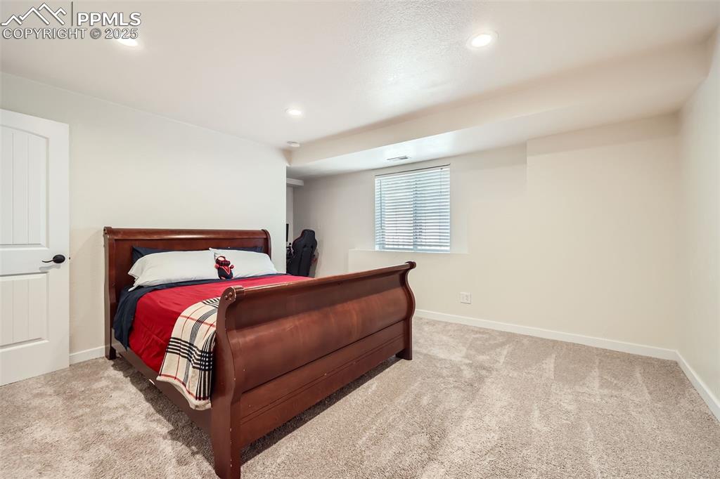 151 Star View Circle Palmer Lake, CO 80133 - Photo 26 of 36 Bedroom with carpet flooring, recessed lighting, and baseboards