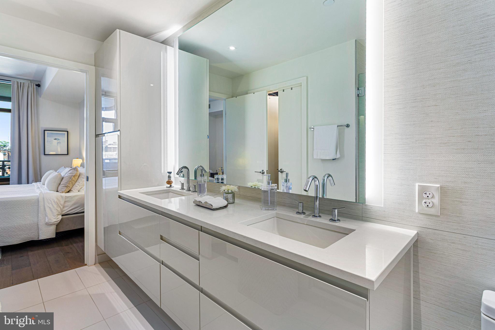 810 O Street Northwest, Unit 406 Washington, DC 20001 - Photo 25 of 43 Porcelanosa Tiled Baths with Backlit Vanity Mirror