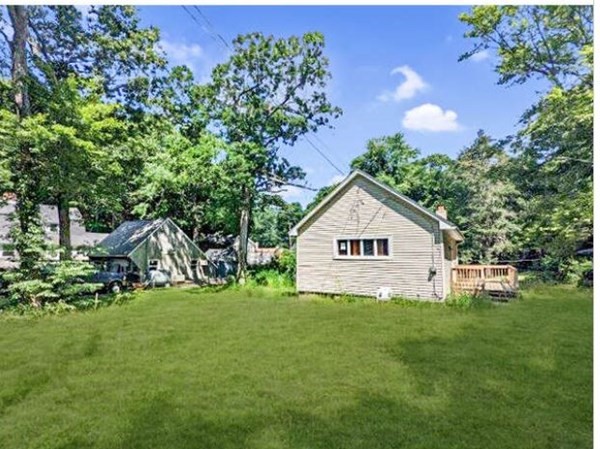 36 Pine Road Charlton, MA 01507 - Photo 2 of 9 a view of a house with a yard and sitting area