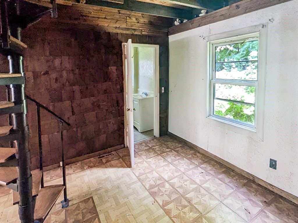 36 Pine Road Charlton, MA 01507 - Photo 6 of 9 a view of an empty room with windows
