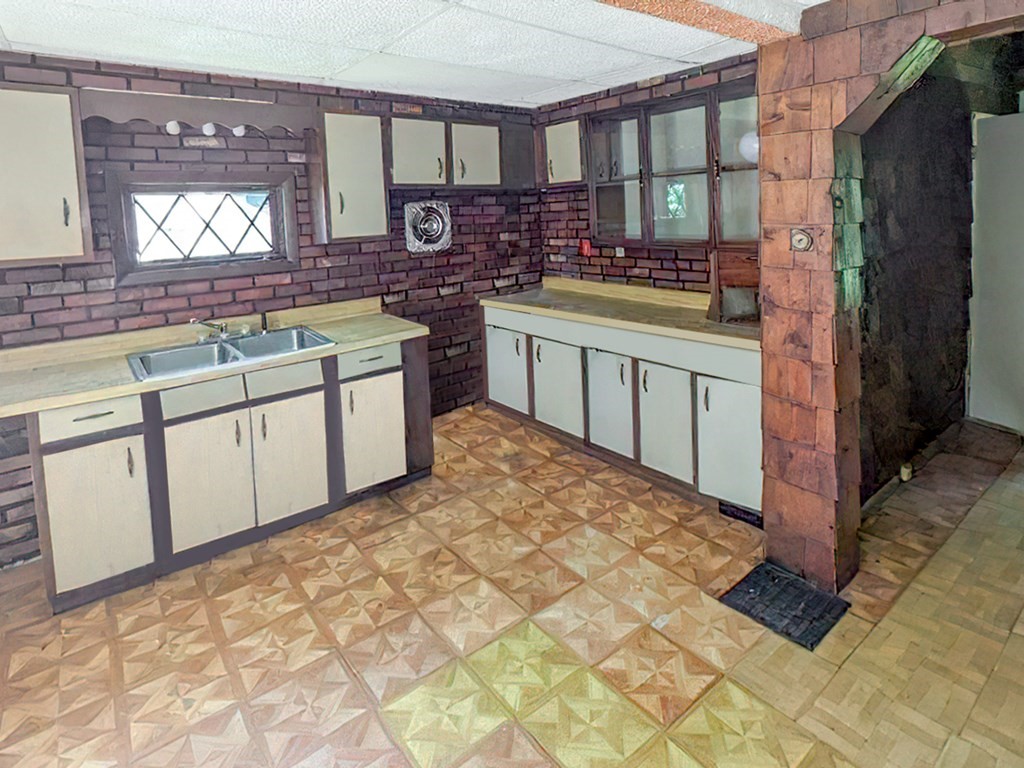 36 Pine Road Charlton, MA 01507 - Photo 8 of 9 a kitchen with stainless steel appliances a sink stove and cabinets