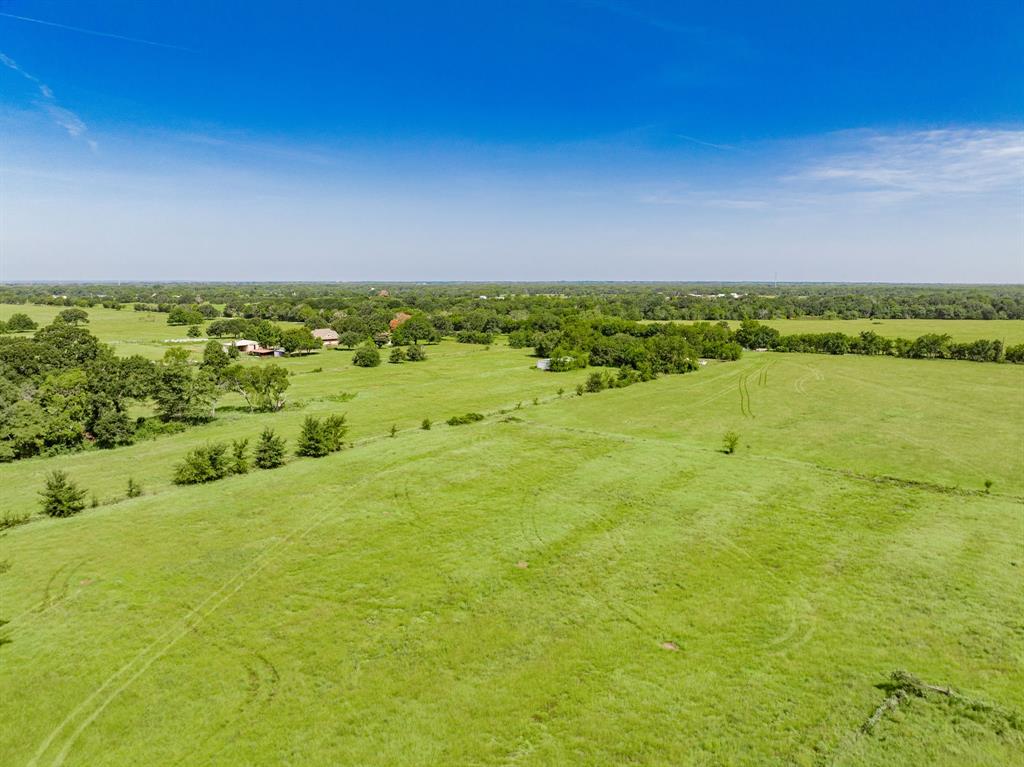 Lot 2 Co Road Kemp, TX 75143 - Photo 13 of 17 Expansive green pastures featuring scattered trees and a distant tree line