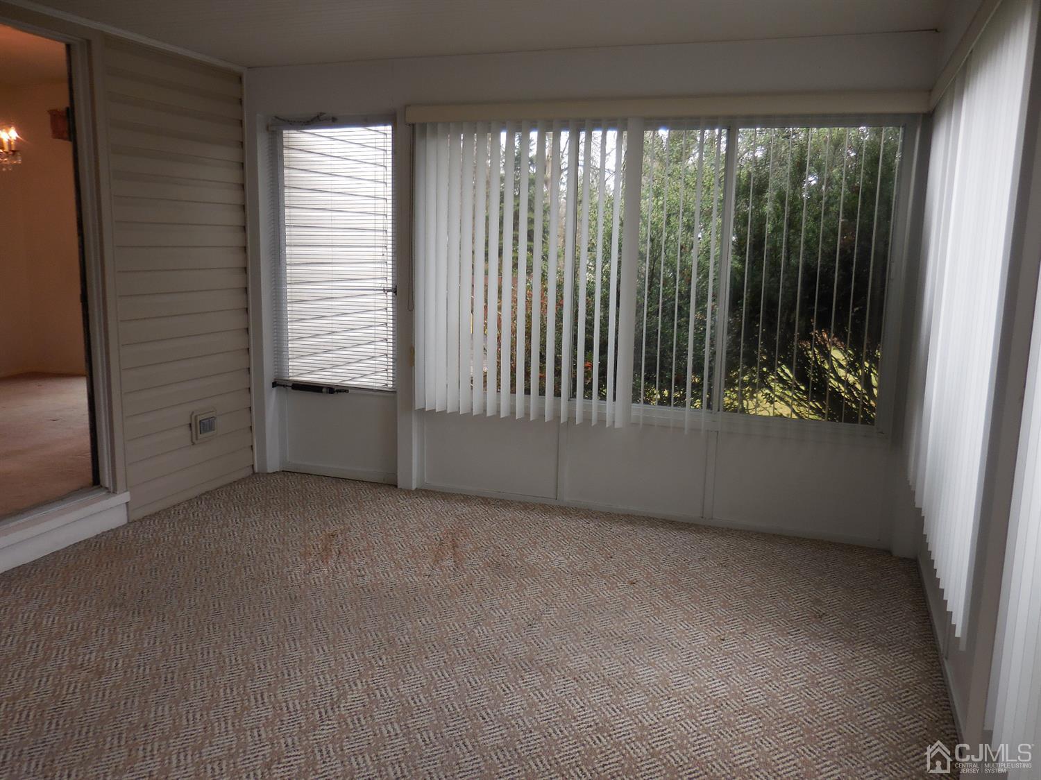 276 Carber Street Bound Brook, NJ 08805 - Photo 11 of 36 a view of an empty room with a window