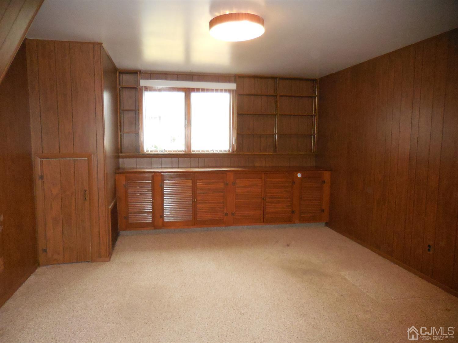 276 Carber Street Bound Brook, NJ 08805 - Photo 29 of 36 an empty room with windows