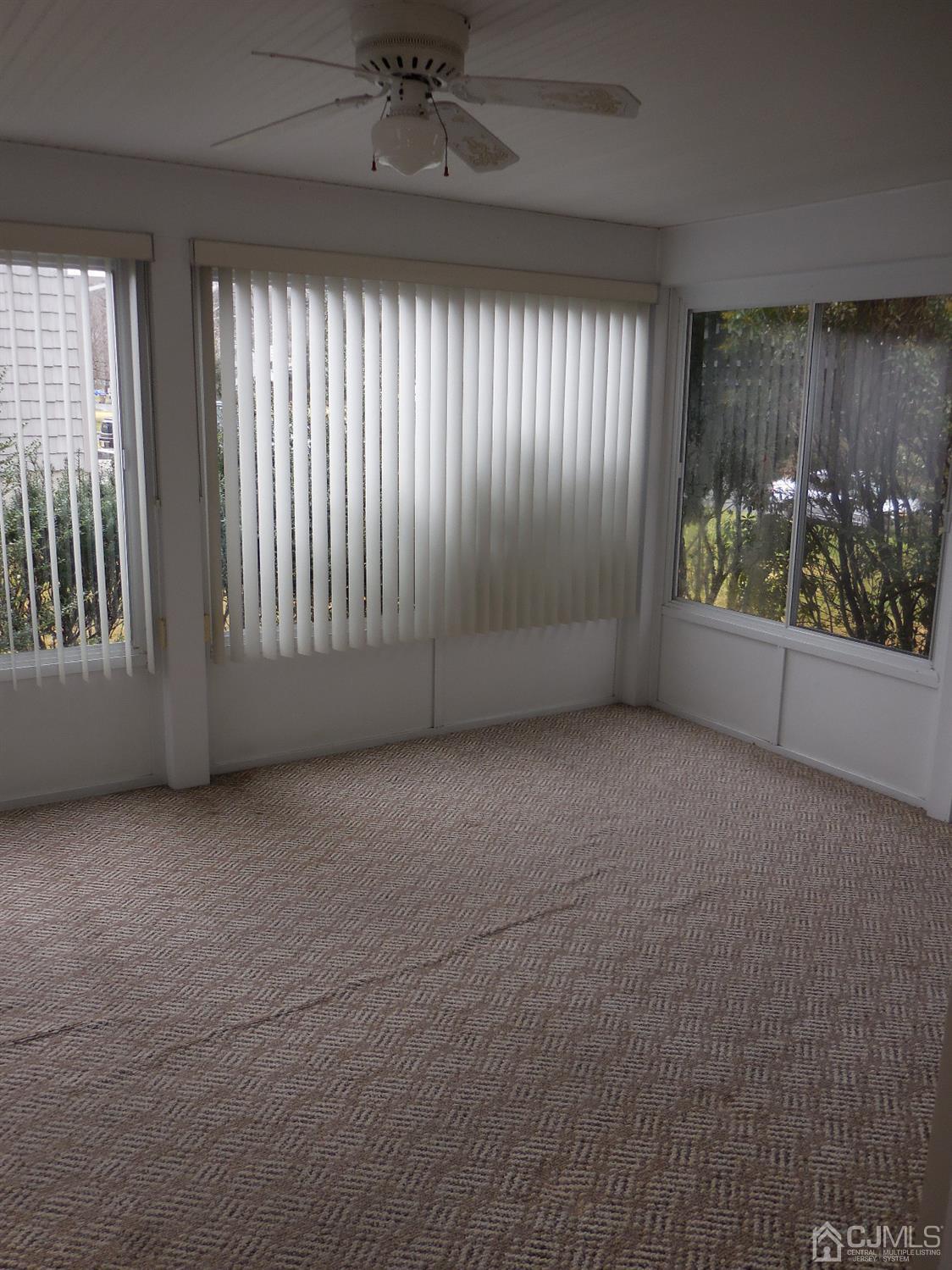 276 Carber Street Bound Brook, NJ 08805 - Photo 10 of 36 an empty room with windows