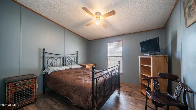 a view of a white house with a outdoor space