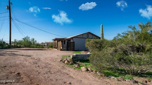a backyard of a house with lots of green space