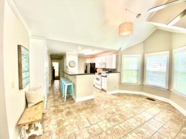4 Patsy Path Iuka, MS 38852 - Photo 12 of 25 a view of a kitchen and dining area with wooden floor