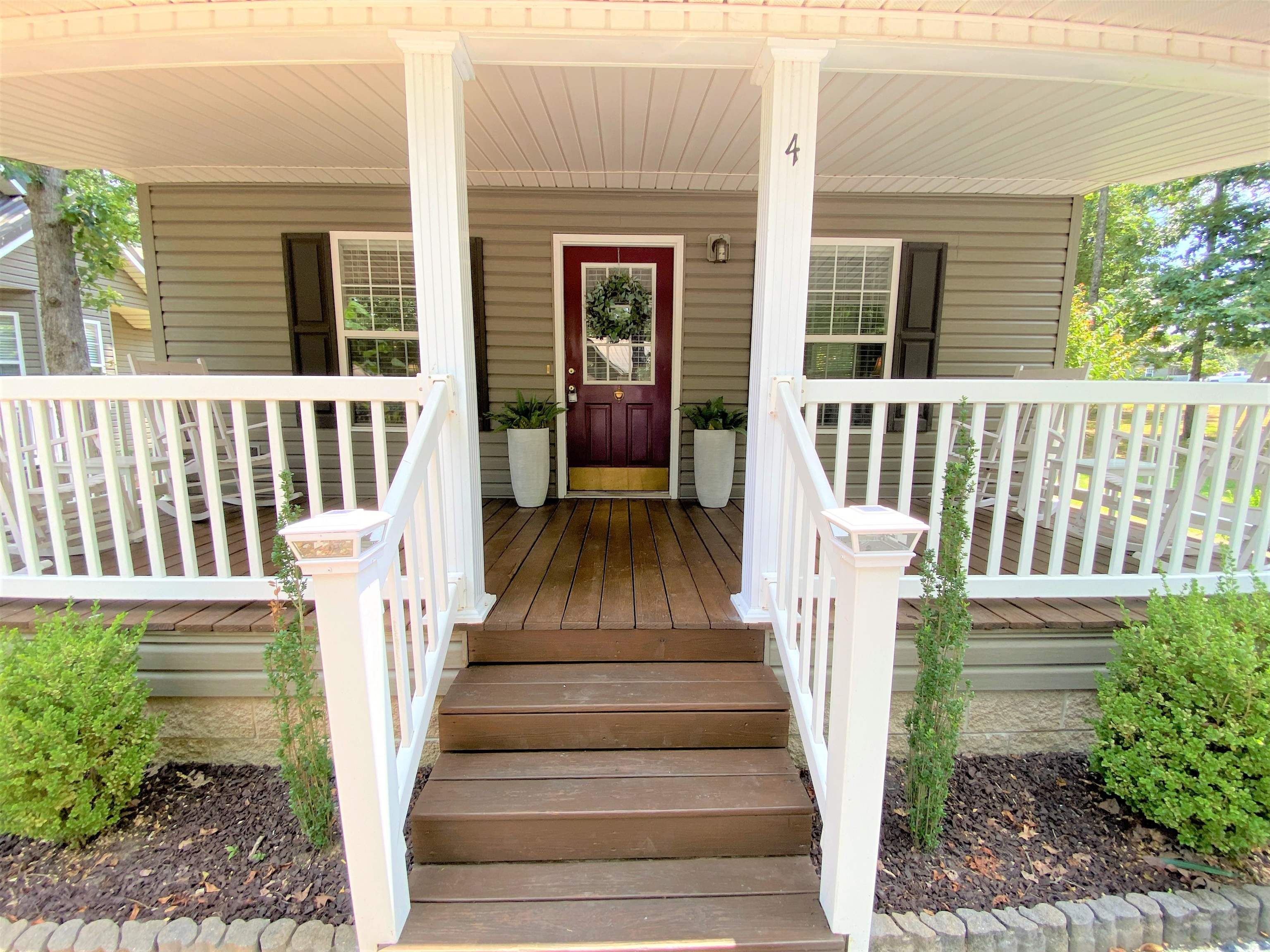 4 Patsy Path Iuka, MS 38852 - Photo 6 of 25 a view of a house with porch and wooden floor