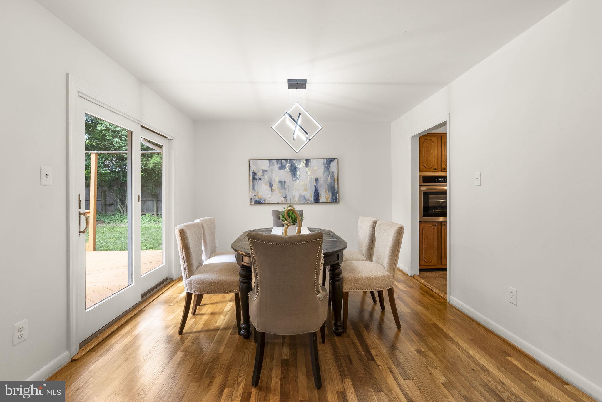 1503 Leister Drive Silver Spring, MD 20904 - Photo 12 of 58 a view of a dining room with furniture window and wooden floor