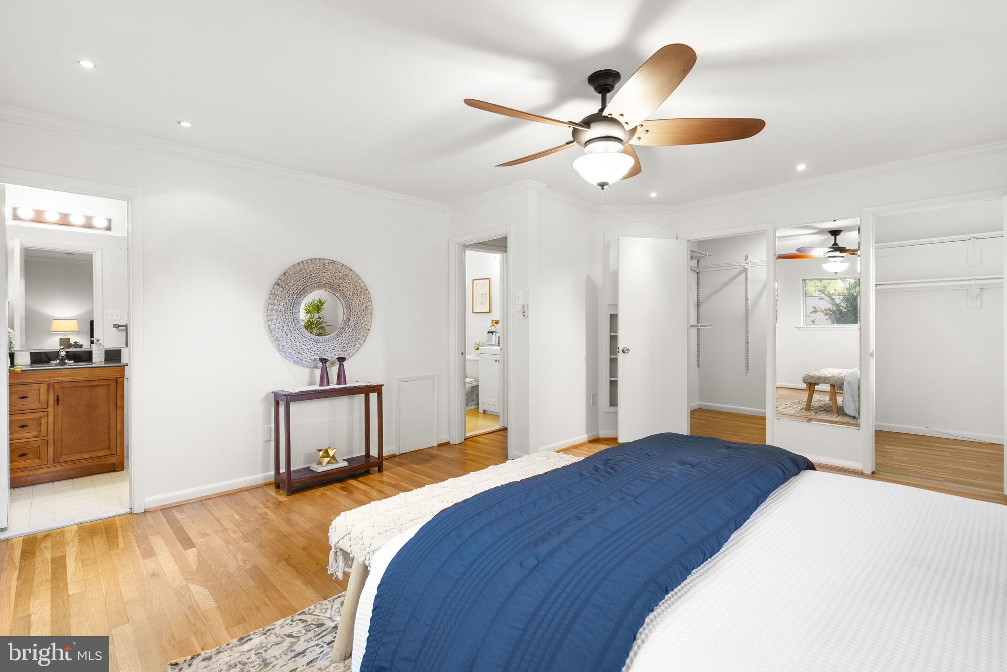 1503 Leister Drive Silver Spring, MD 20904 - Photo 25 of 58 a bedroom with a bed and a chandelier