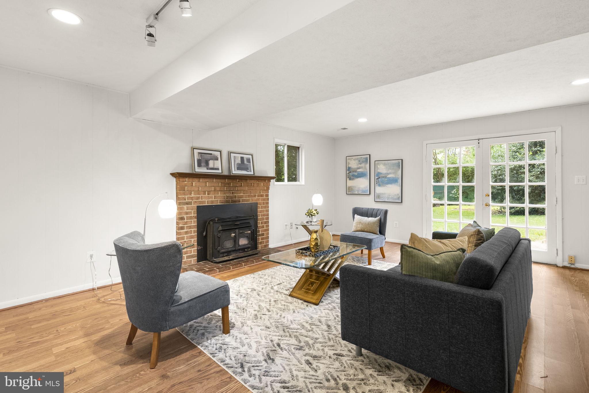 1503 Leister Drive Silver Spring, MD 20904 - Photo 39 of 58 a living room with furniture and a fireplace