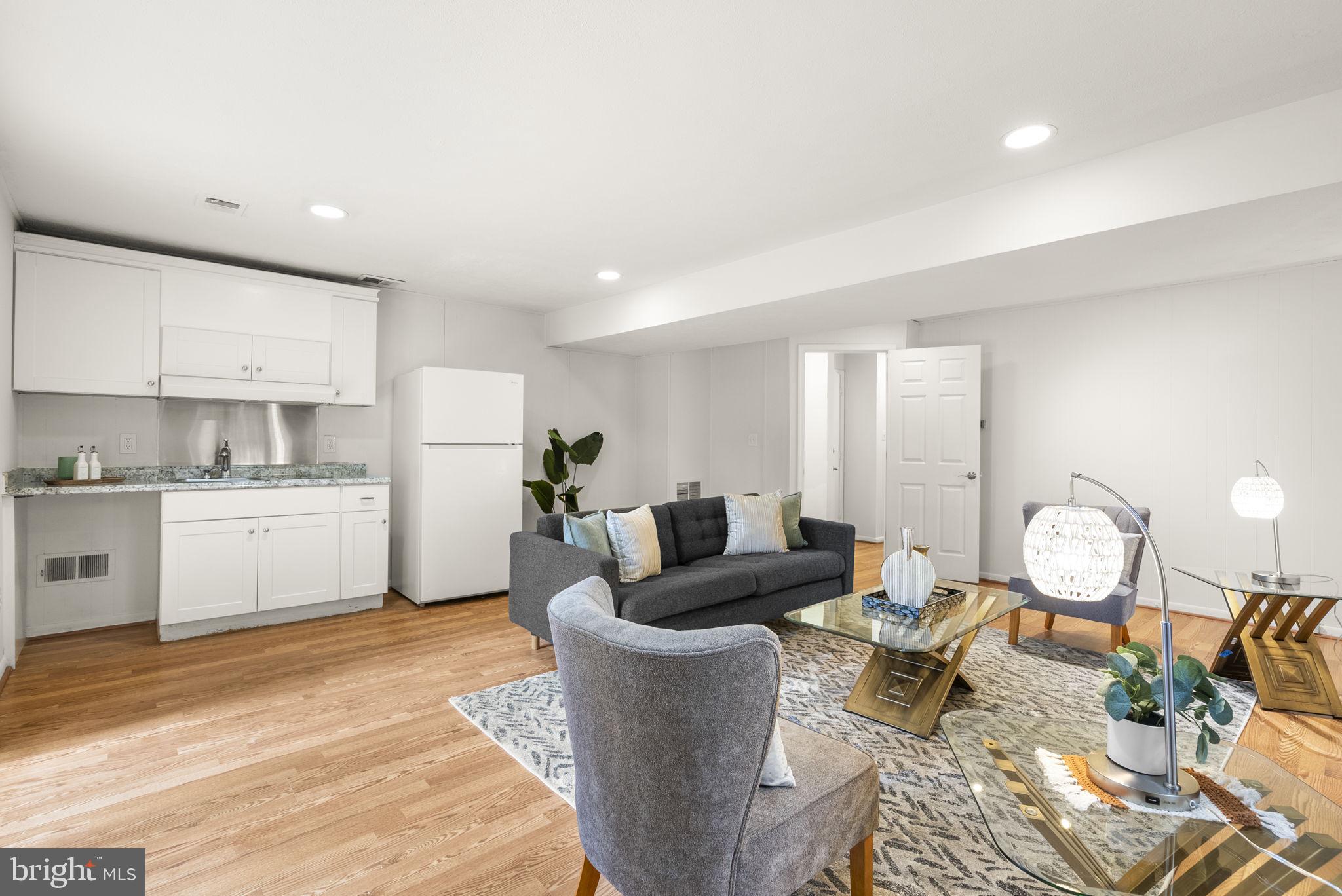 1503 Leister Drive Silver Spring, MD 20904 - Photo 42 of 58 a living room with furniture and wooden floor