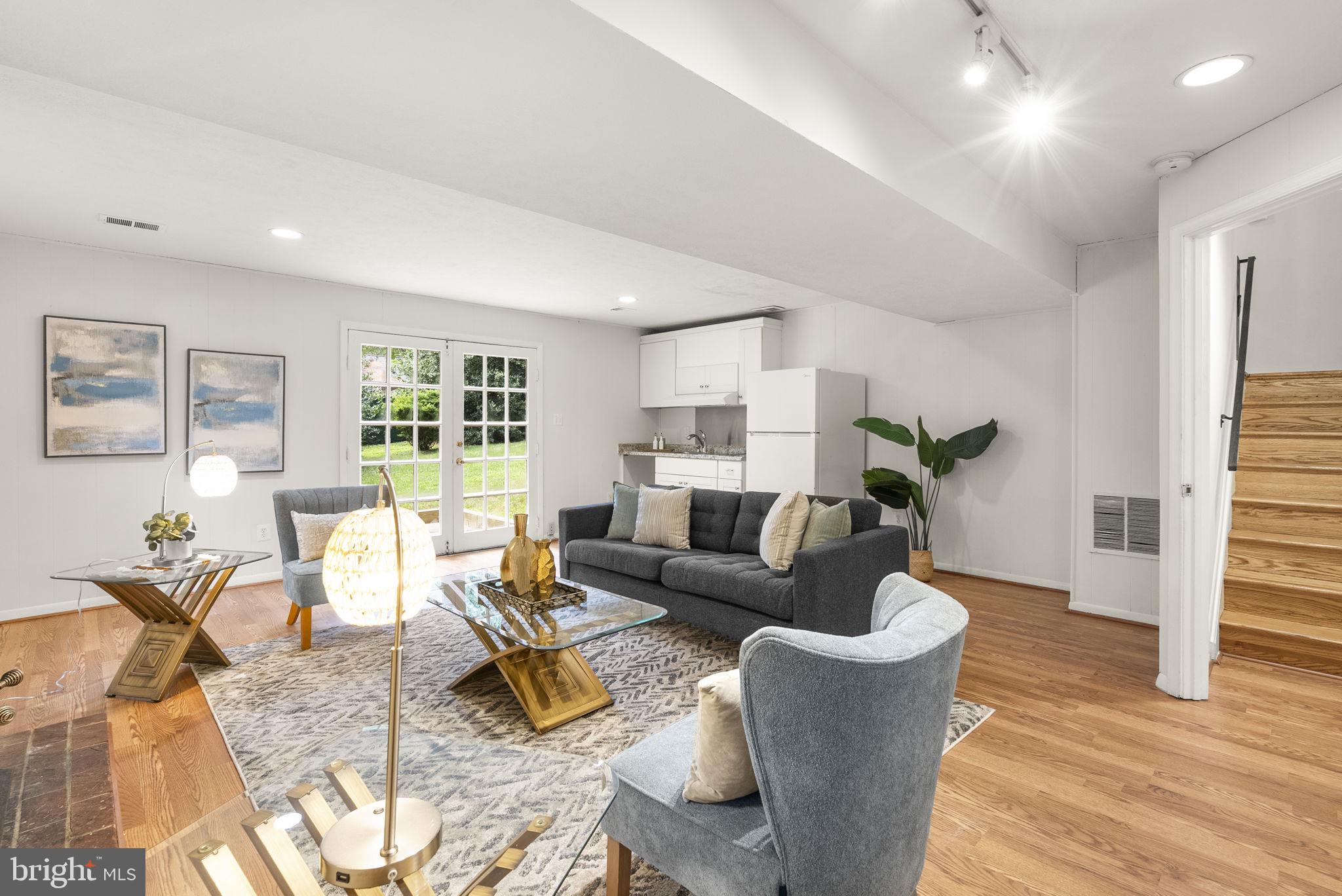 1503 Leister Drive Silver Spring, MD 20904 - Photo 43 of 58 a living room with furniture and a wooden floor