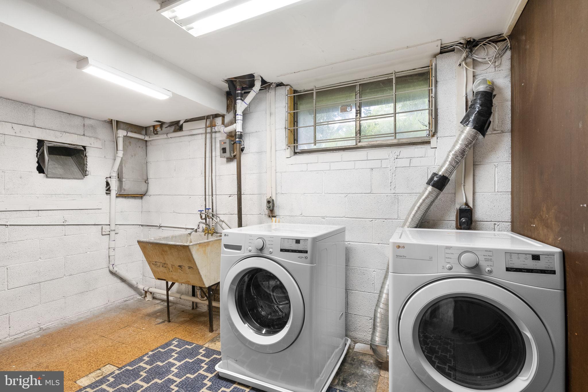 1503 Leister Drive Silver Spring, MD 20904 - Photo 50 of 58 a view of a hallway with washer and dryer