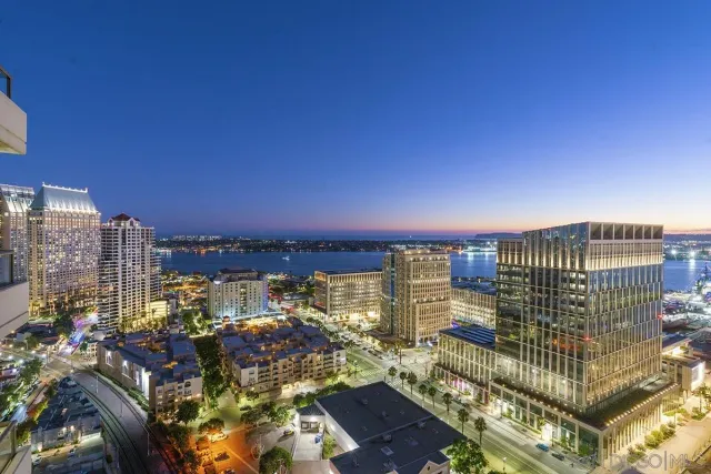 a view of a city with tall buildings