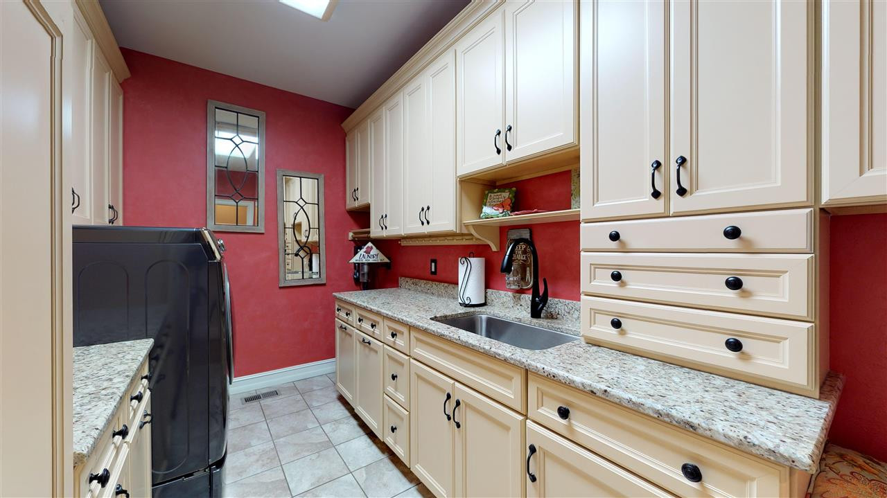 13609 Possum Track Road Raleigh, NC 27614 - Photo 14 of 30 First floor laundry