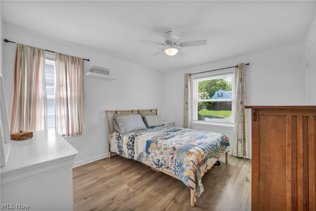 4117 Wyncote Road South Euclid, OH 44121 - Photo 27 of 50 Bright interior space featuring wood-finish flooring, white walls, and a ceiling fan with integrated lighting