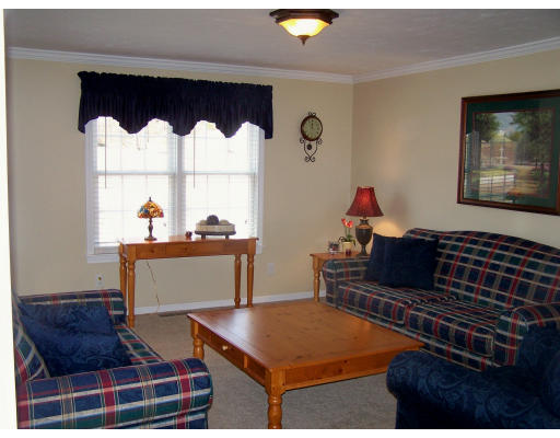 227 Morgan Road Northbridge, MA 01588 - Photo 8 of 13 a living room with furniture and a window