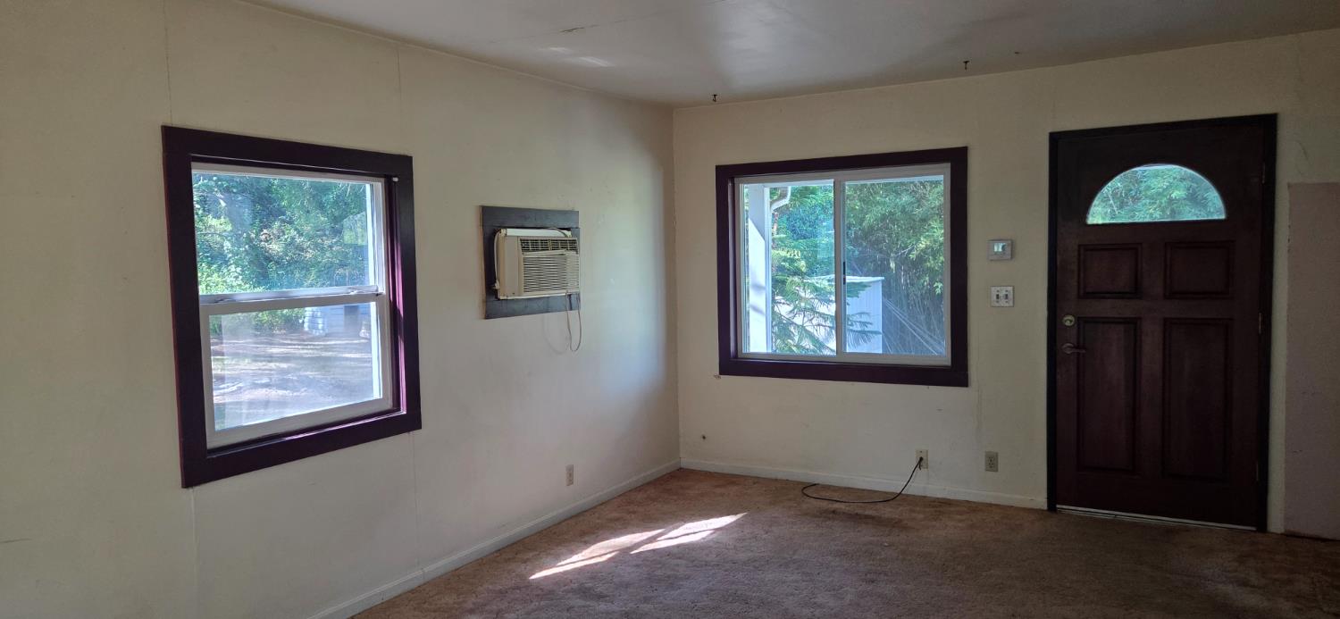 1661 Taylor Road Penryn, CA 95663 - Photo 9 of 16 an empty room that has a window