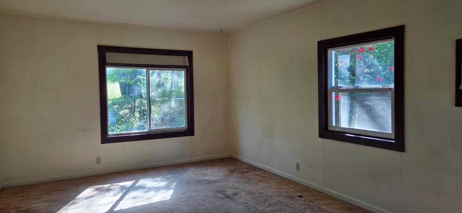 1661 Taylor Road Penryn, CA 95663 - Photo 10 of 16 a view of an empty room with a window