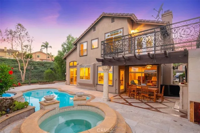 a view of a chairs and table in the patio