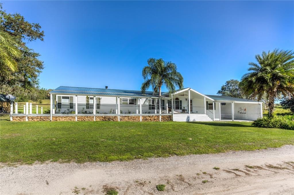 909 Cato Ranch Road Fruitland Park, FL 34731 - Photo 1 of 1 Amazing, one of a kind property with a runway, hardwwod floors, 2 master bedrooms and so much more on 5 acres.
