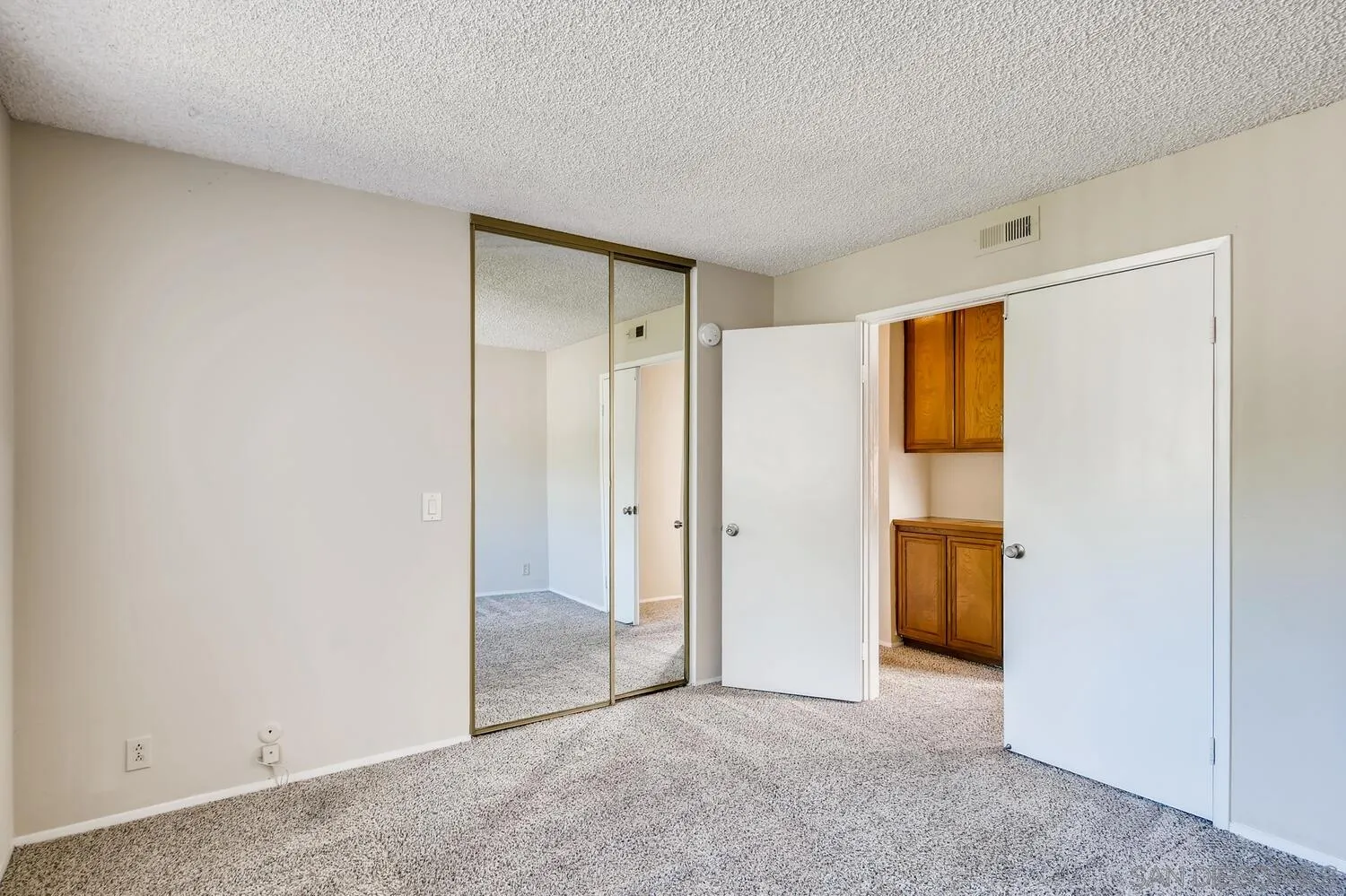 8271 Caminito Modena San Diego, CA 92037 - Photo 13 of 28 a view of an empty room