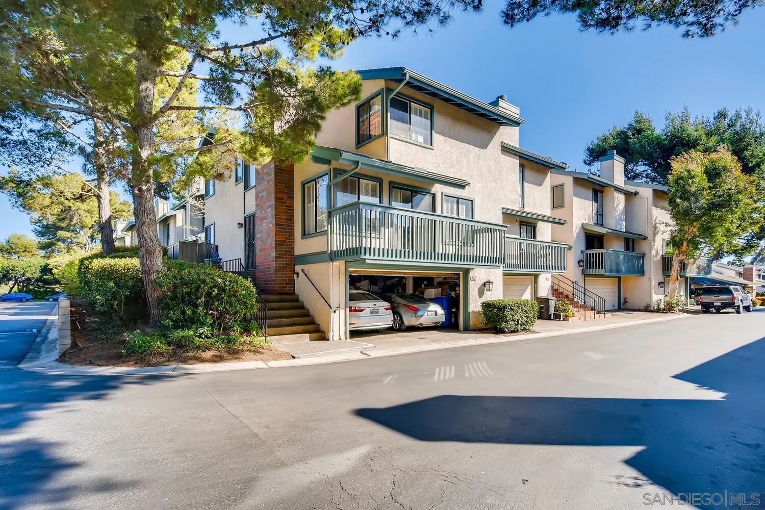 8271 Caminito Modena San Diego, CA 92037 - Photo 17 of 28 a view of building with large windows