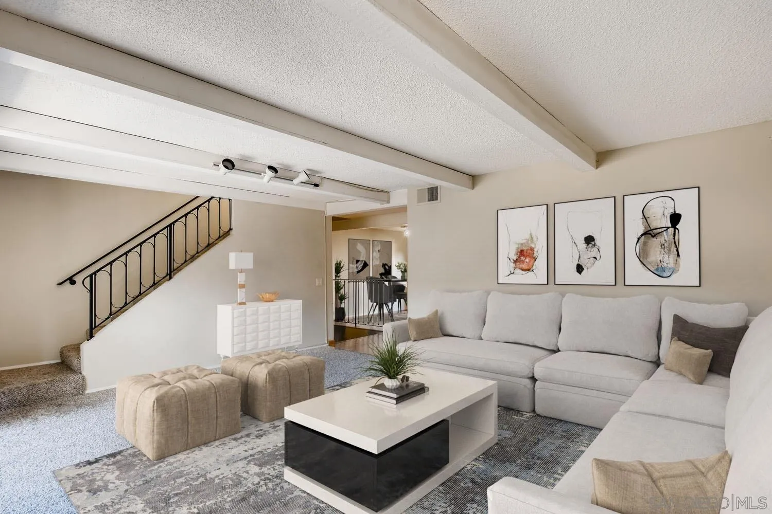 8271 Caminito Modena San Diego, CA 92037 - Photo 2 of 28 a living room with furniture and wooden floor