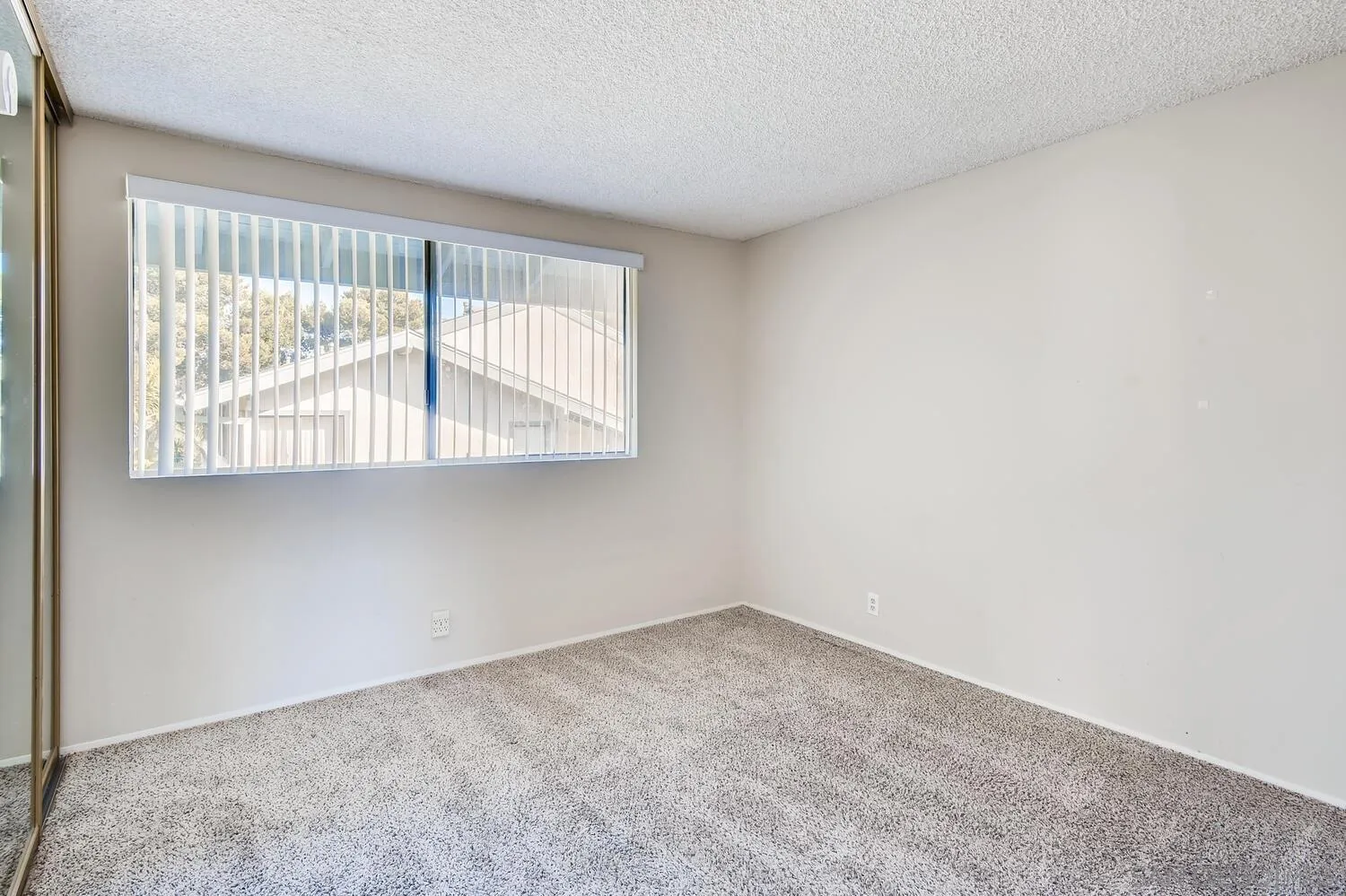 8271 Caminito Modena San Diego, CA 92037 - Photo 10 of 28 an empty room with a window