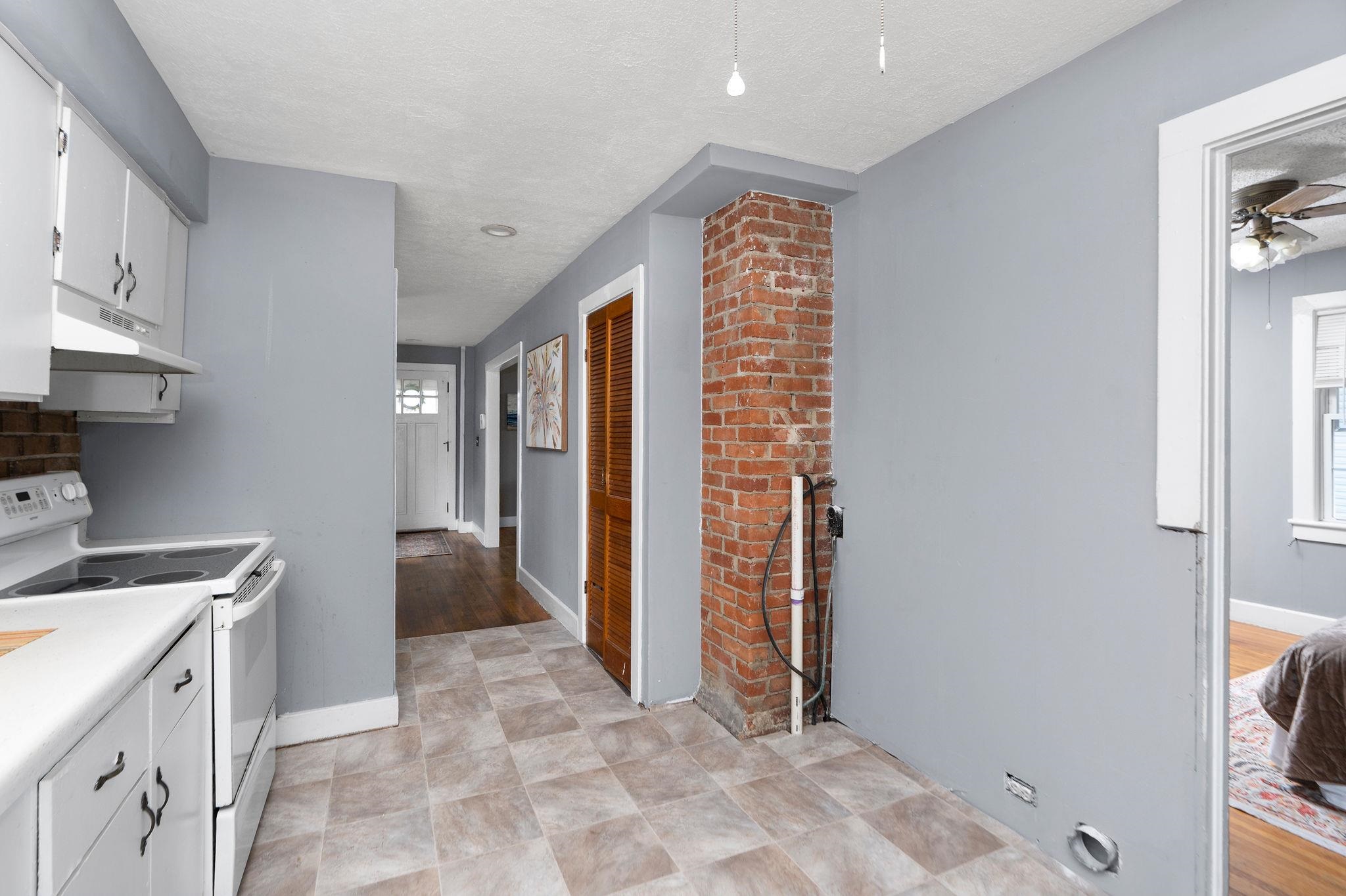 712 Nelson Street Staunton, VA 24401 - Photo 12 of 30 a view of kitchen with stainless steel appliances granite countertop a refrigerator and a sink