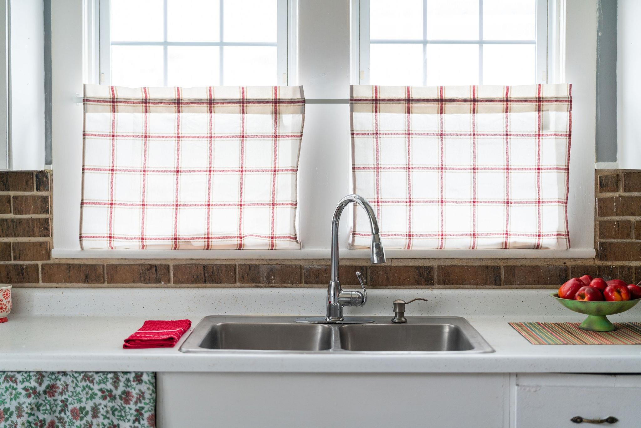 712 Nelson Street Staunton, VA 24401 - Photo 15 of 30 a kitchen with a sink and a window