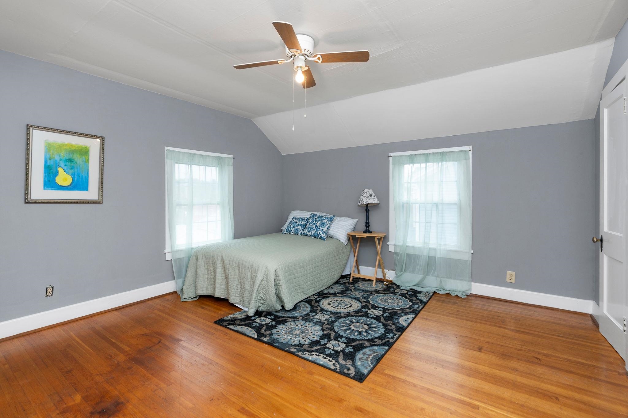 712 Nelson Street Staunton, VA 24401 - Photo 22 of 30 a bedroom with a bed and window
