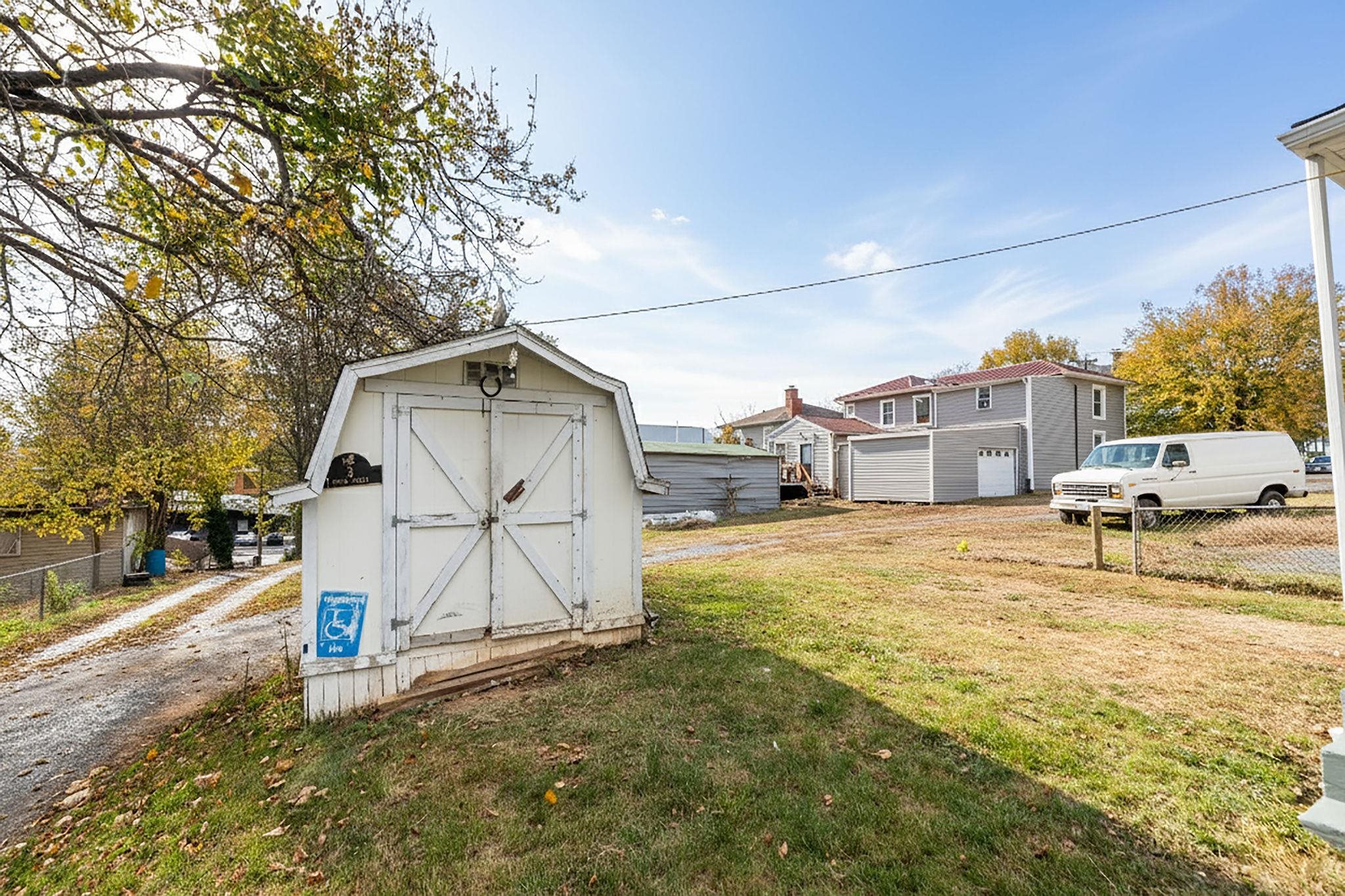 712 Nelson Street Staunton, VA 24401 - Photo 27 of 30 a house with trees in front of it