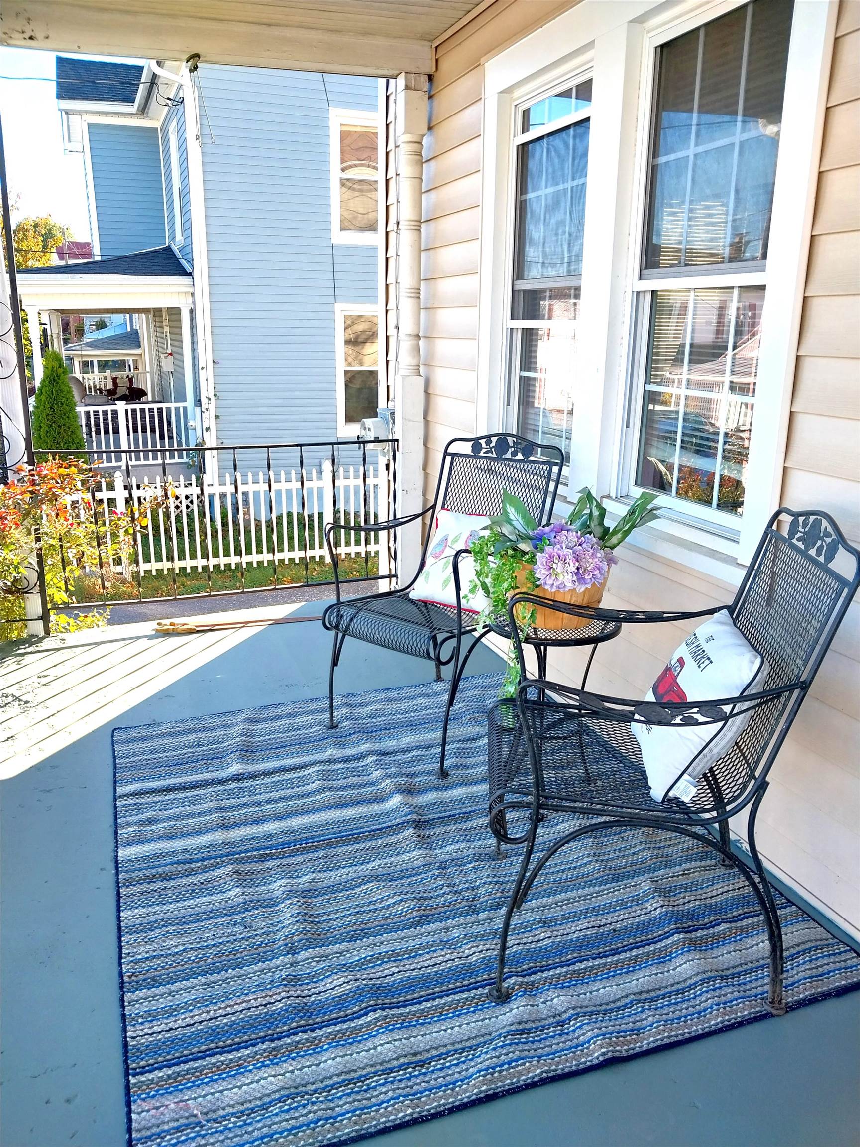 712 Nelson Street Staunton, VA 24401 - Photo 4 of 30 a view of a deck with table and chairs with wooden floor