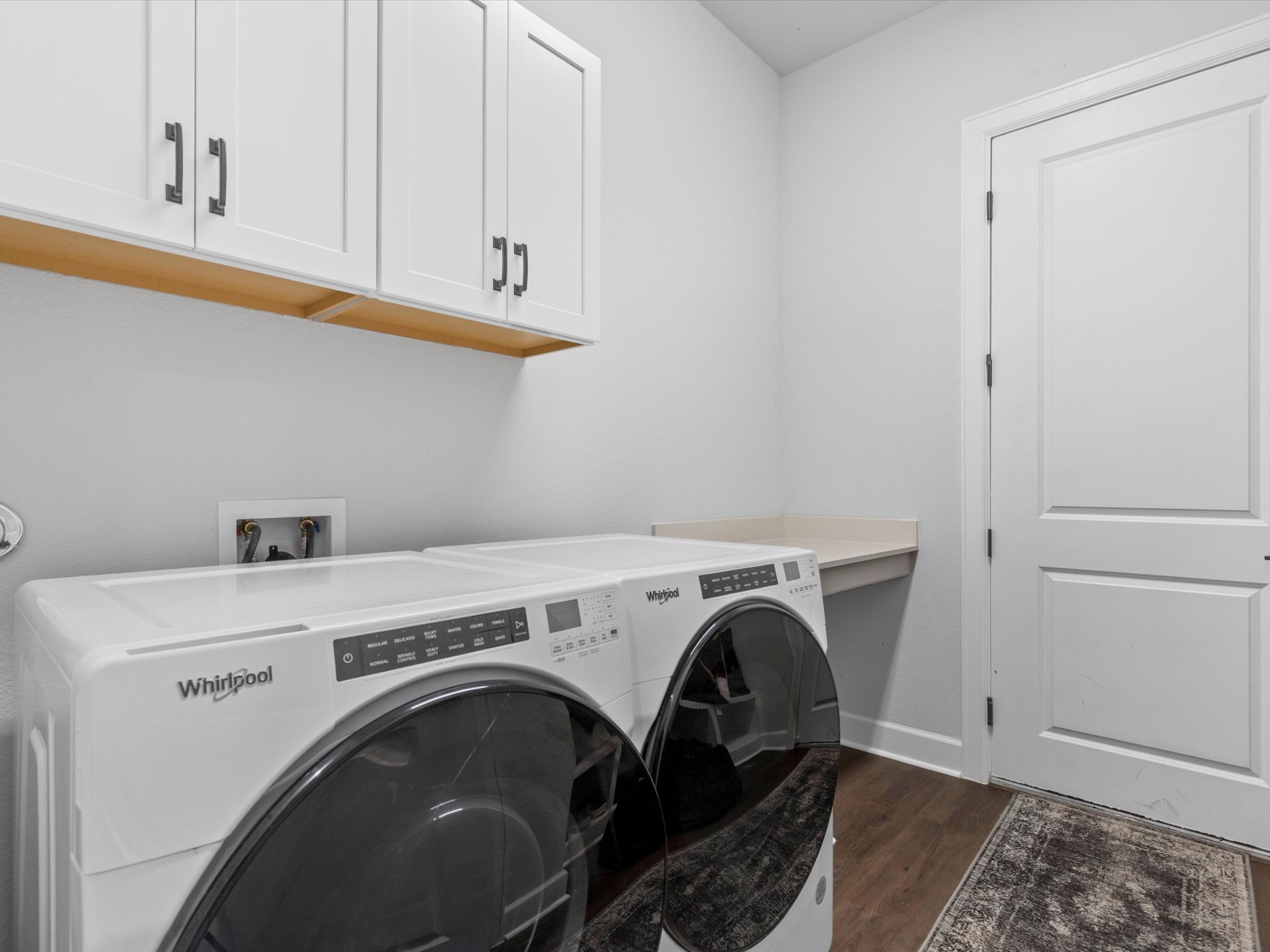9001 Centurion Path Austin, TX 78744 - Photo 26 of 40 a utility room with dryer and washer