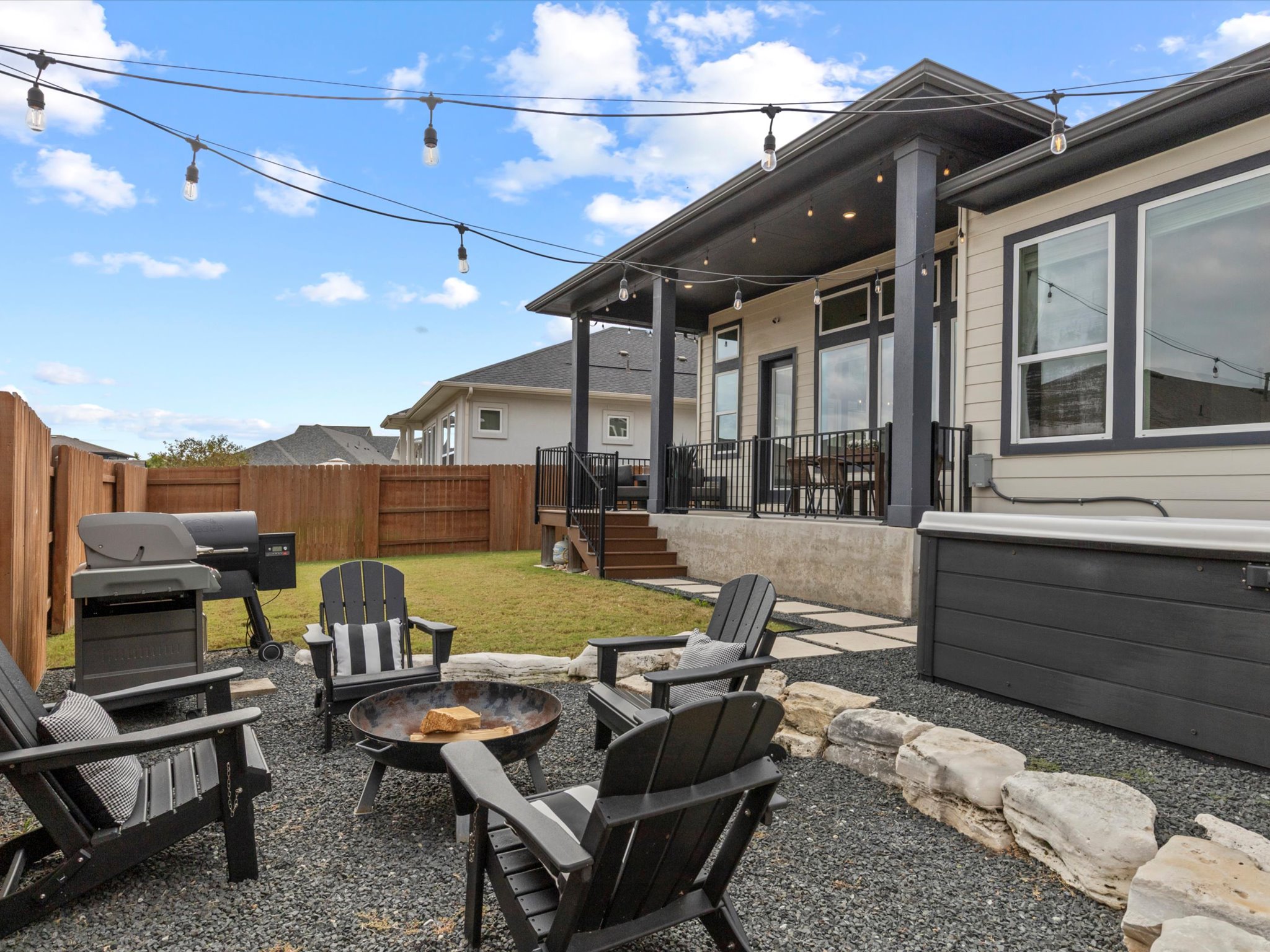 9001 Centurion Path Austin, TX 78744 - Photo 31 of 40 a view of a patio with chairs and a table