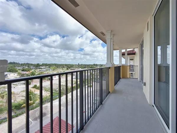 a view of a balcony with city view
