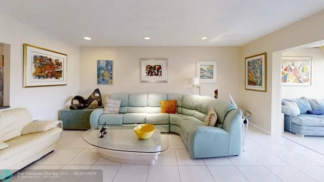 a living room with furniture and a couch
