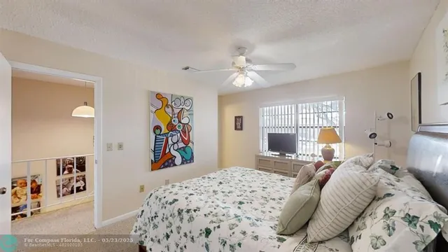 a bathroom with a sink a toilet a mirror and vanity