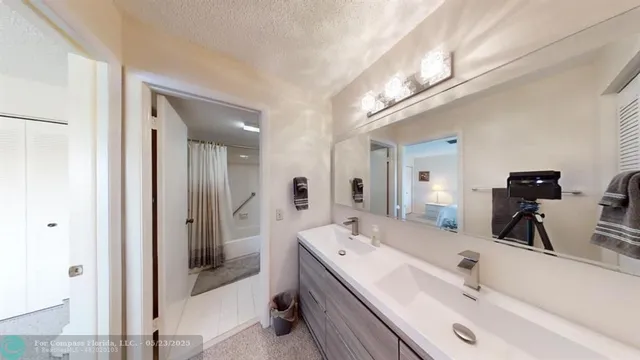 a bathroom with a shower and a toilet