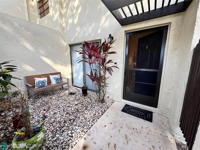 a vase of flowers sitting on a table