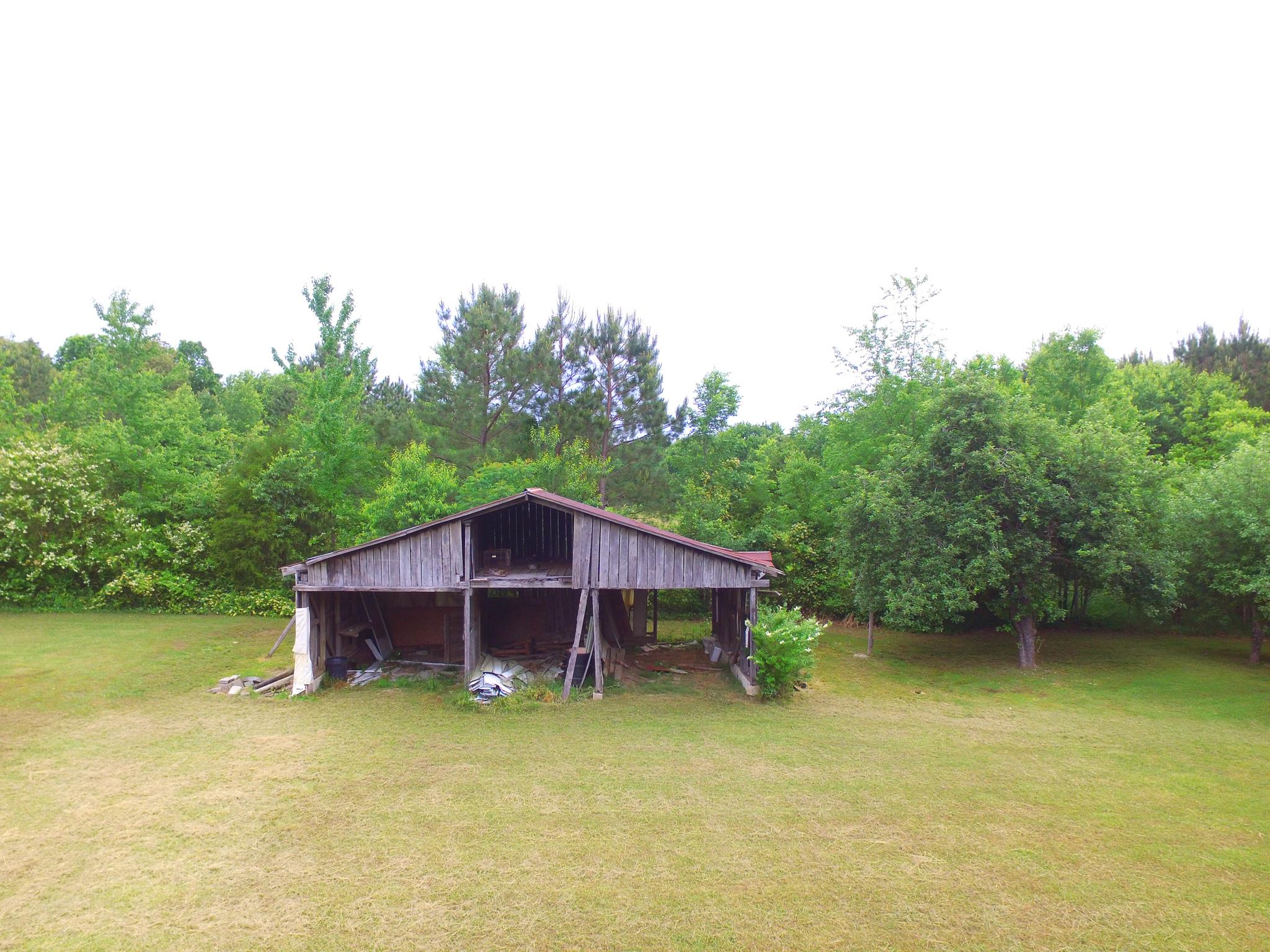 3955 Asbury Road Manchester, TN 37355 - Photo 18 of 19 a view of a house with a yard