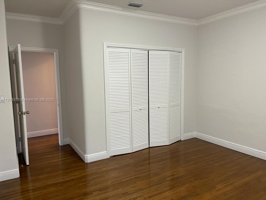 501 Southwest 24th Road Miami, FL 33129 - Photo 15 of 25 wooden floor in an empty room