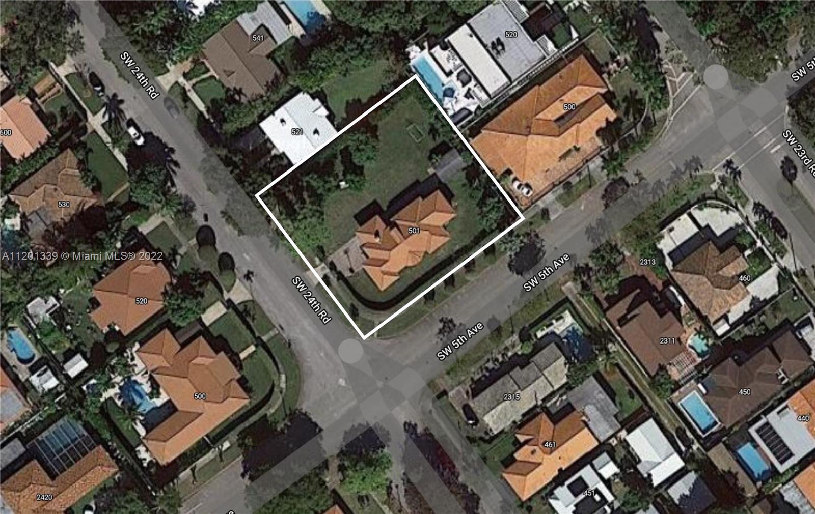 501 Southwest 24th Road Miami, FL 33129 - Photo 19 of 25 an aerial view of a city with lots of residential buildings