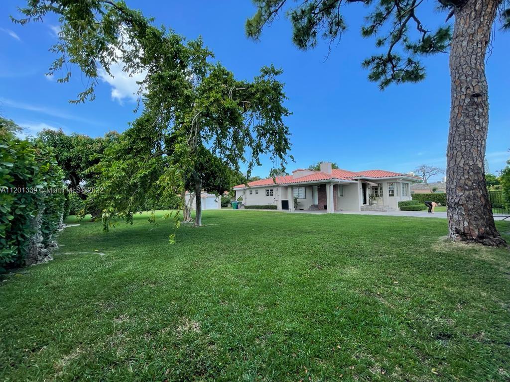 501 Southwest 24th Road Miami, FL 33129 - Photo 22 of 25 a view of a house with a yard