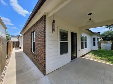 a view of a porch of a house